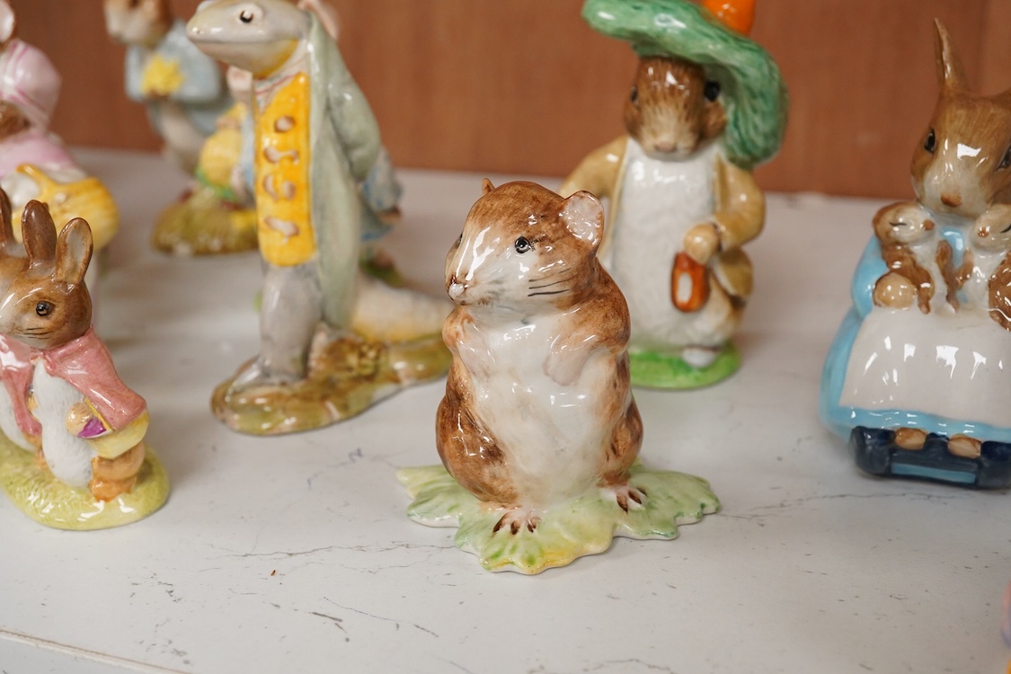Twenty Beatrix Potter figures, mostly later production figures, largest 11cm high